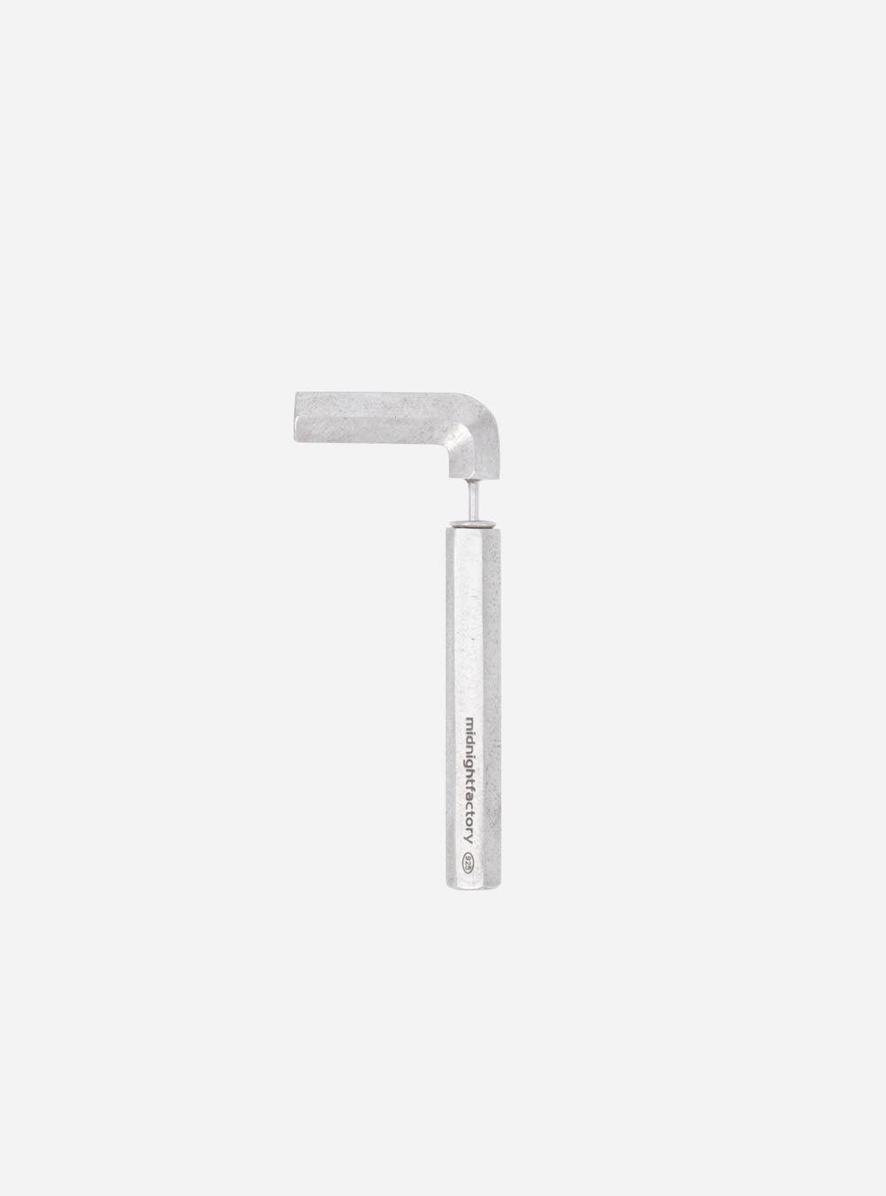 a MIDNIGHTFACTORY HONG KONG Allen-key earring handle on a white background.