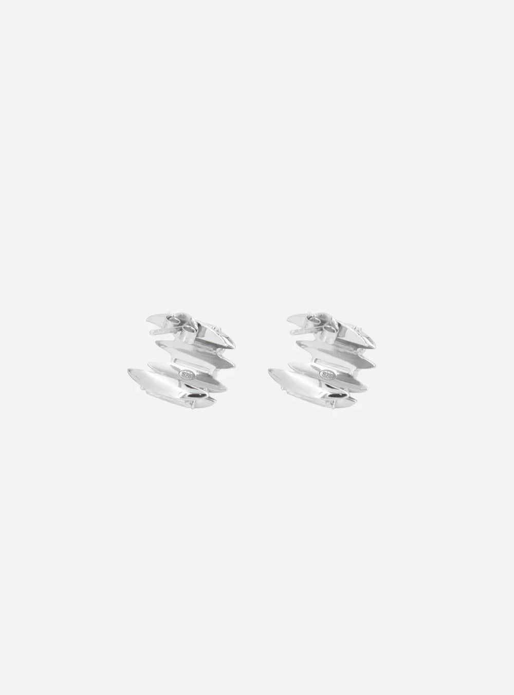 a pair of MIDNIGHTFACTORY Talon eternity earrings on a white surface.