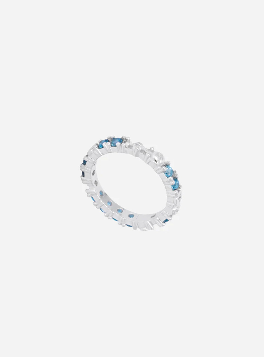 a MIDNIGHTFACTORY Broken eternity ring with blue topaz stones.