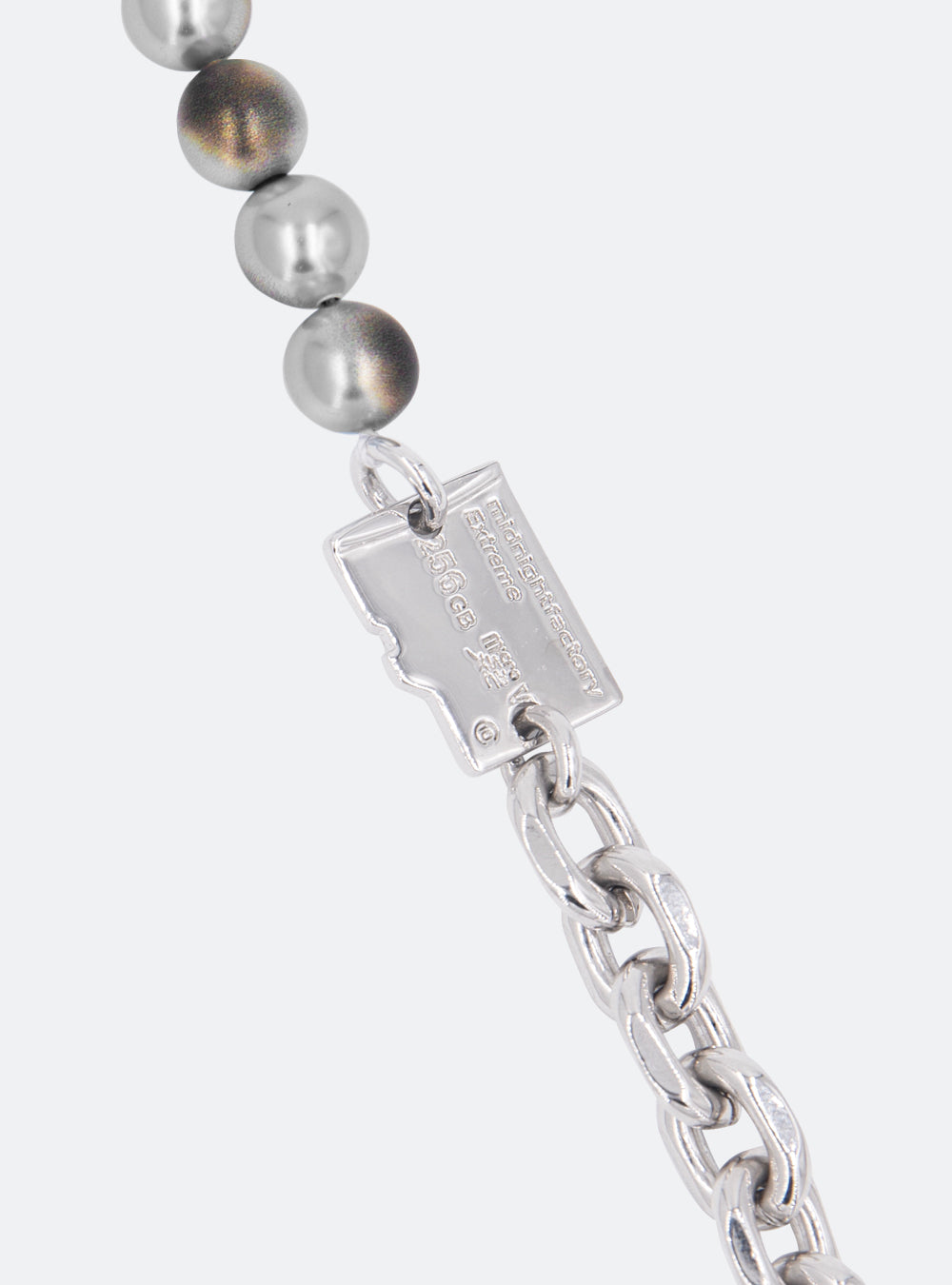 A Micro-SD gray burnt pearls necklace with adjustable length, manufactured by MIDNIGHTFACTORY. [Pre-order]
