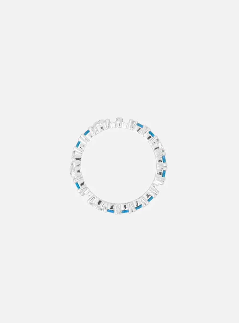 a MIDNIGHTFACTORY white gold bracelet with blue stones.