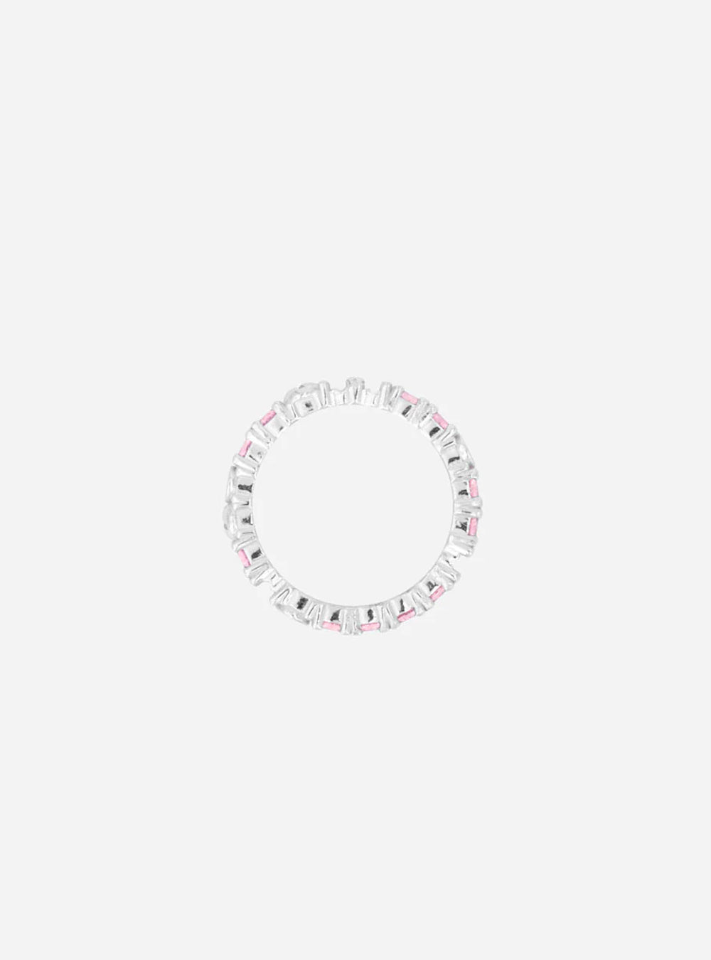 A Broken eternity ring with pink stones on a white background from MIDNIGHTFACTORY.