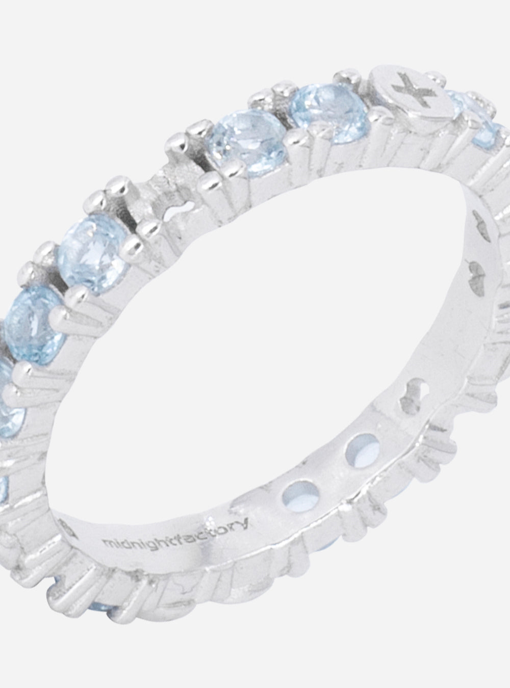 a Broken eternity ring with topaz stones by MIDNIGHTFACTORY.