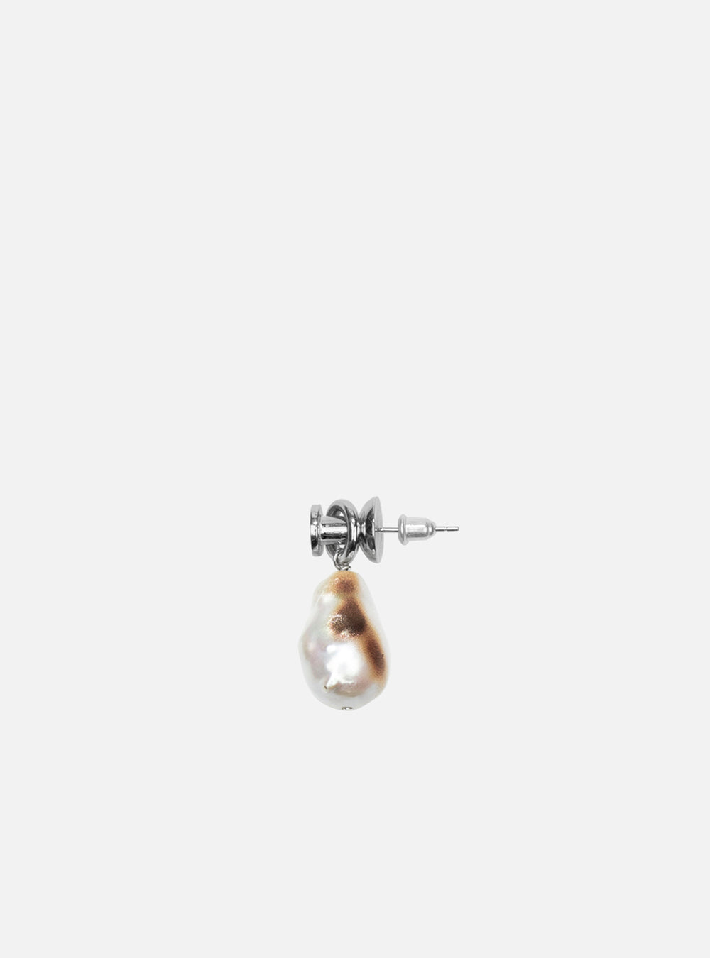 A Burnt baroque pearl with push-pin earring by MIDNIGHTFACTORY on a white surface.