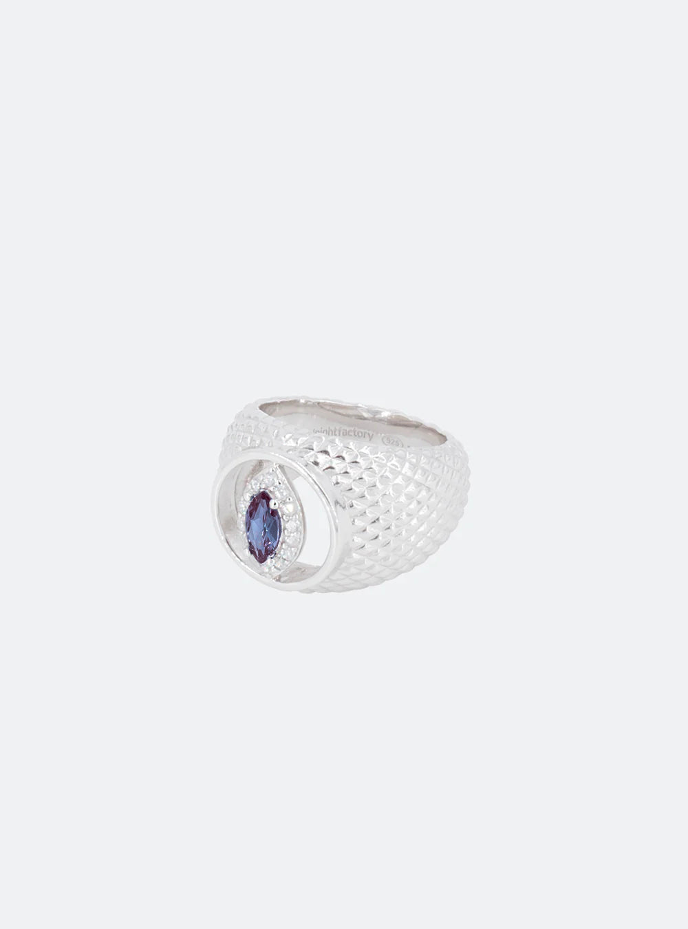 A Cat-eye cutout Alexandrite cocktail signet ring from MIDNIGHTFACTORY with a blue sapphire.