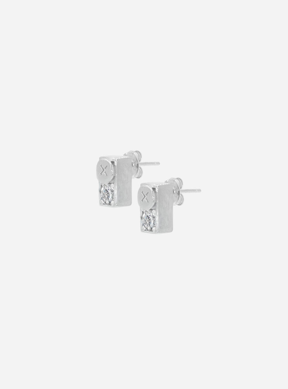 a pair of MIDNIGHTFACTORY Screwbox earrings on a white background.