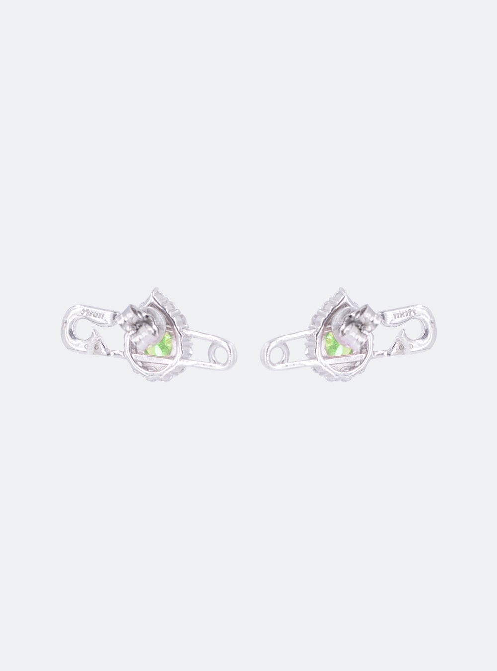 A pair of MIDNIGHTFACTORY Cocktail safety-pin earrings with green stones on a white background.