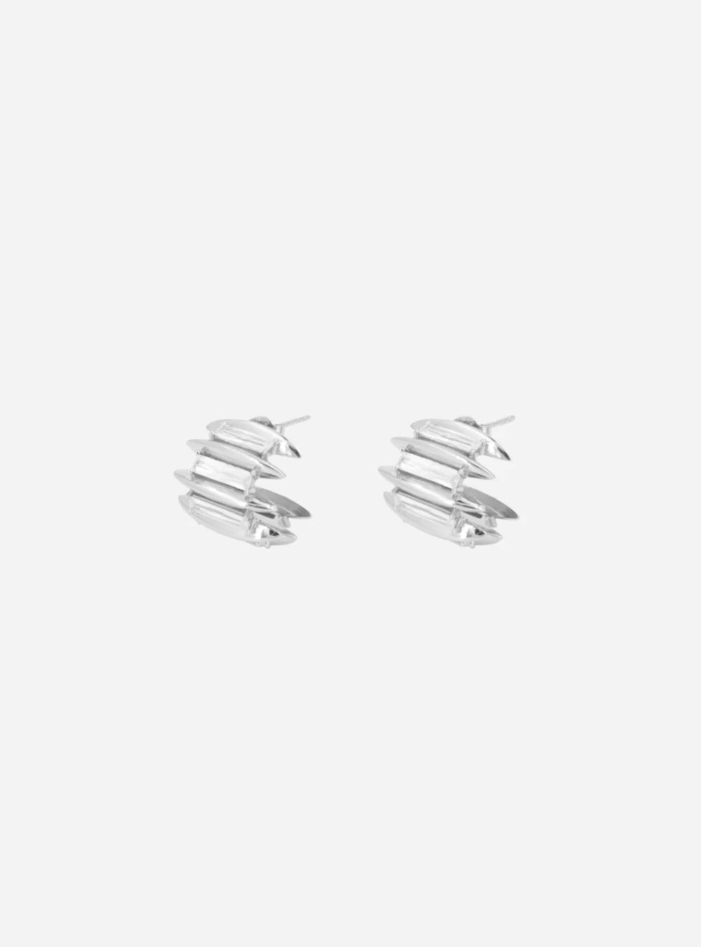 A pair of MIDNIGHTFACTORY Talon eternity earrings on a white surface.