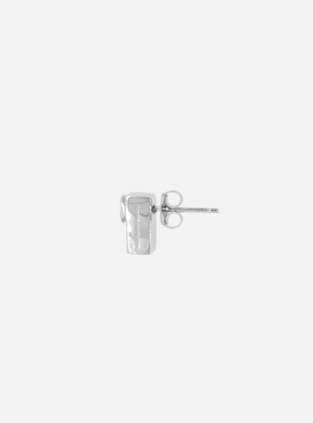 A small silver stud Screwbox topaz earring on a white background by MIDNIGHTFACTORY.