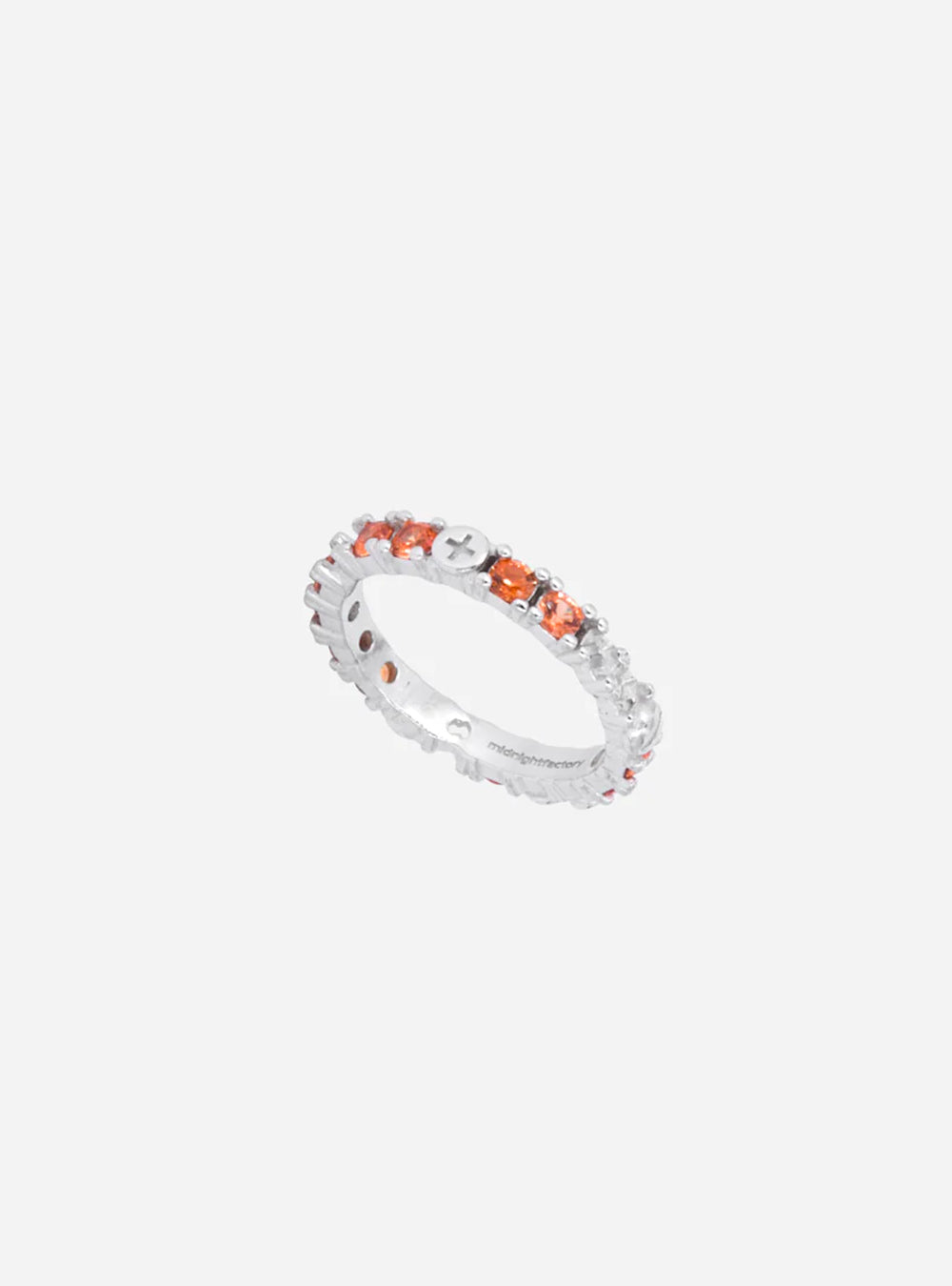 A Broken eternity ring with sapphire from MIDNIGHTFACTORY on a white background.