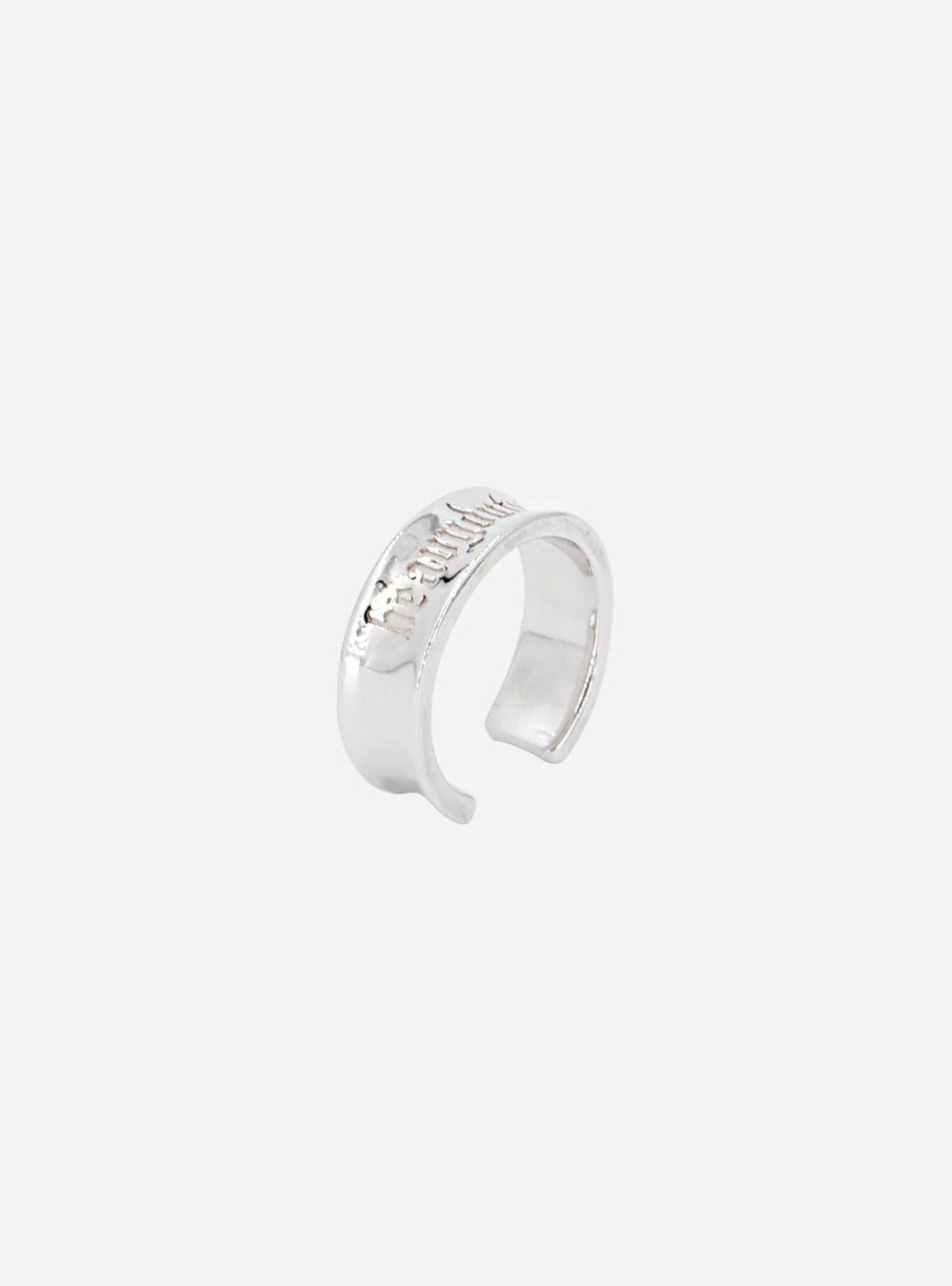 a HEAVYDUTYKID ring from MIDNIGHTFACTORY with diamonds on it.
