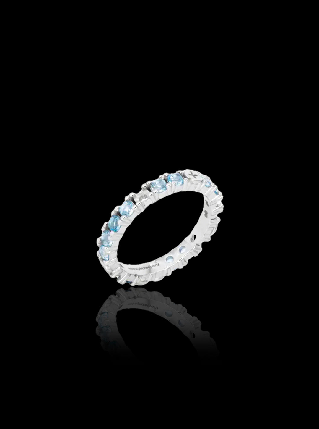 Broken eternity ring with topaz
