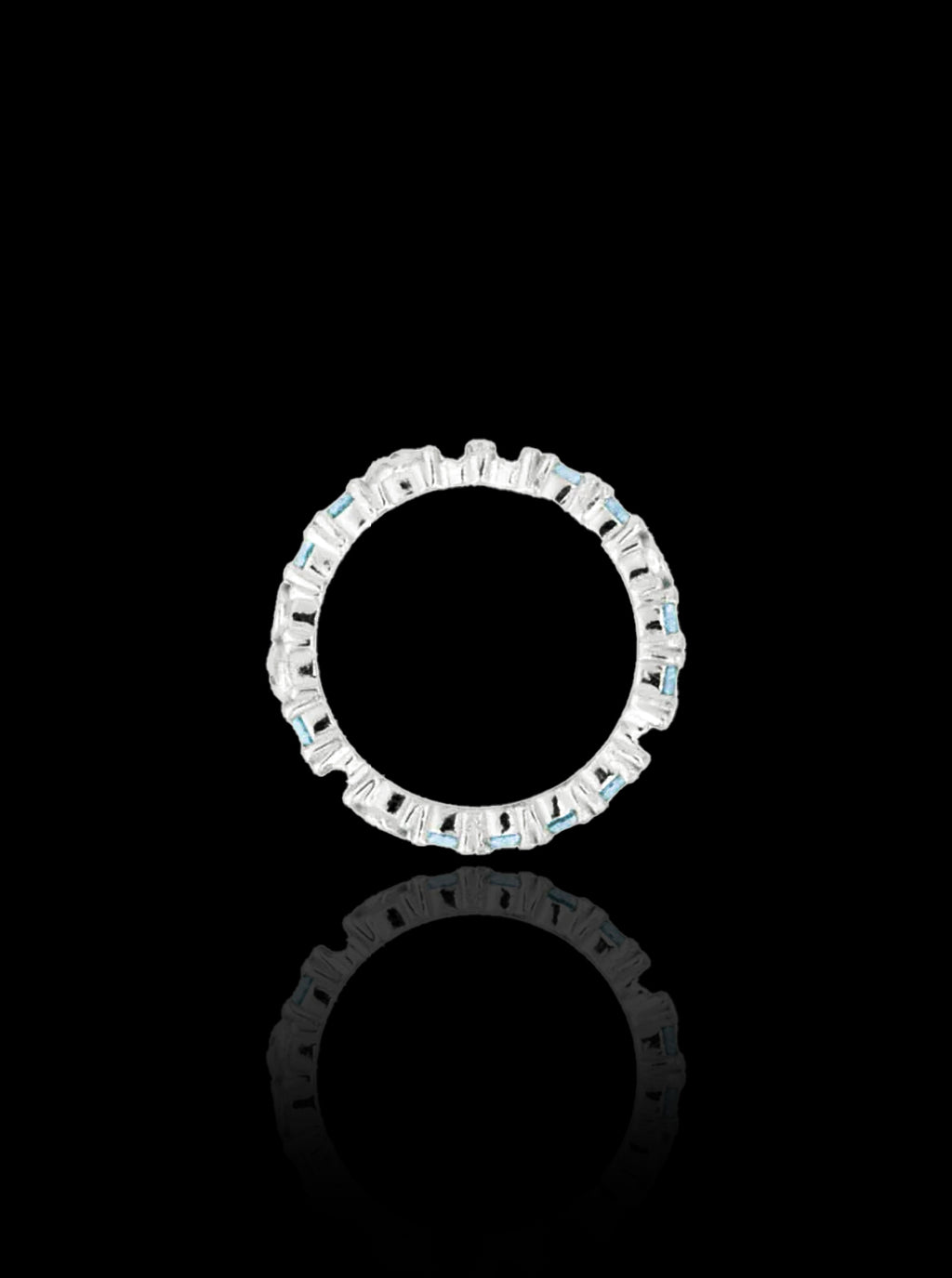 Broken eternity ring with topaz