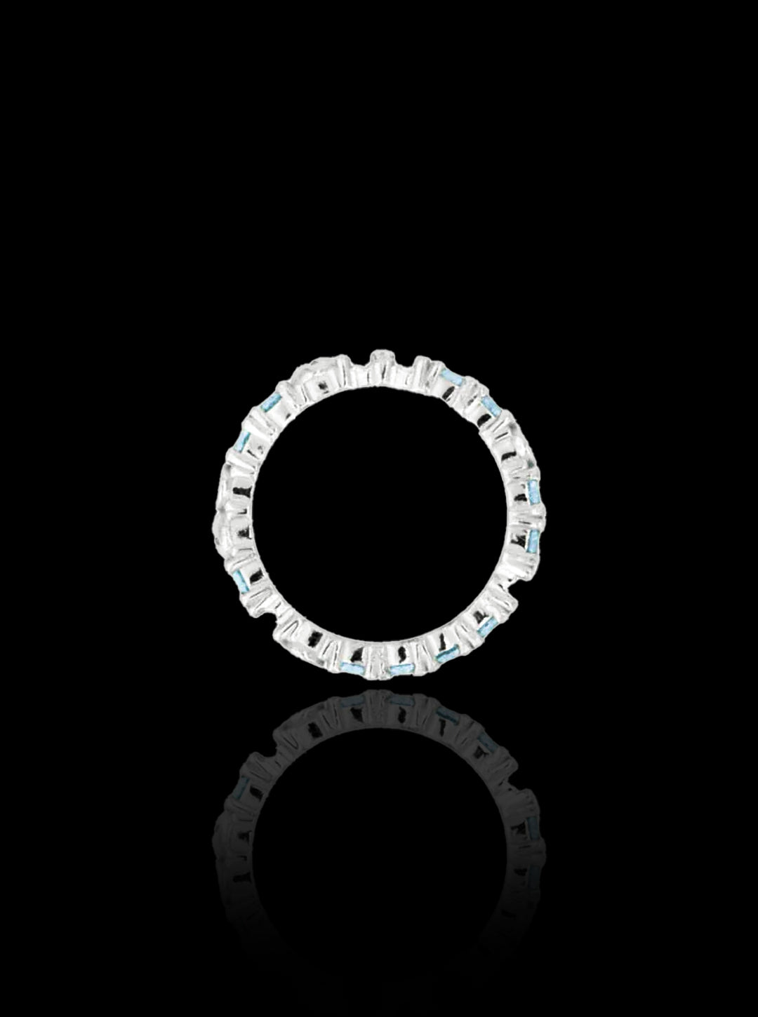 Broken eternity ring with topaz