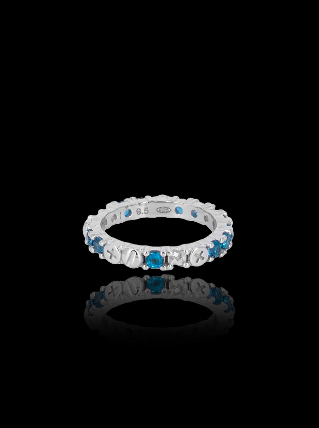 Broken eternity ring with topaz