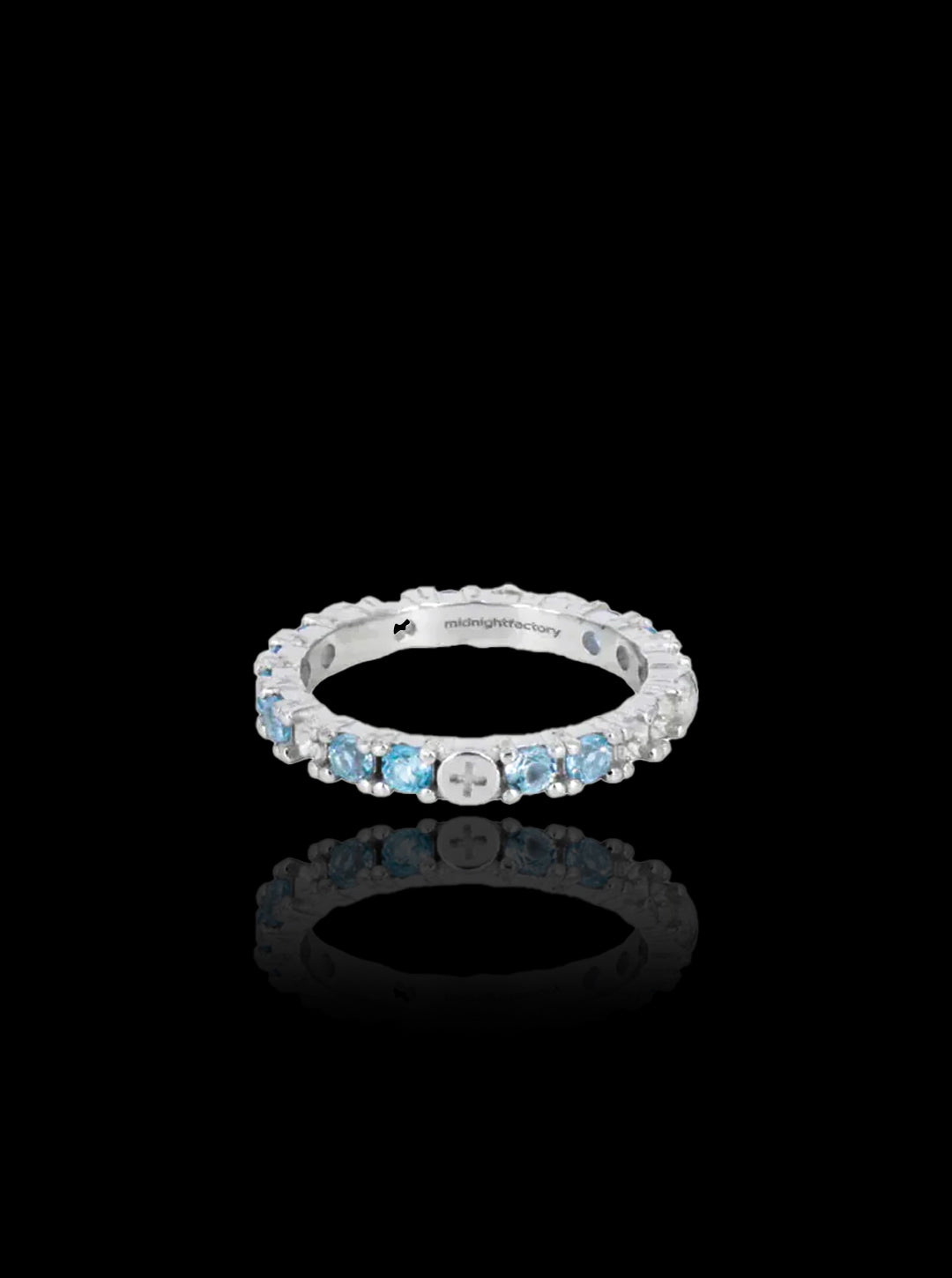 Broken eternity ring with topaz