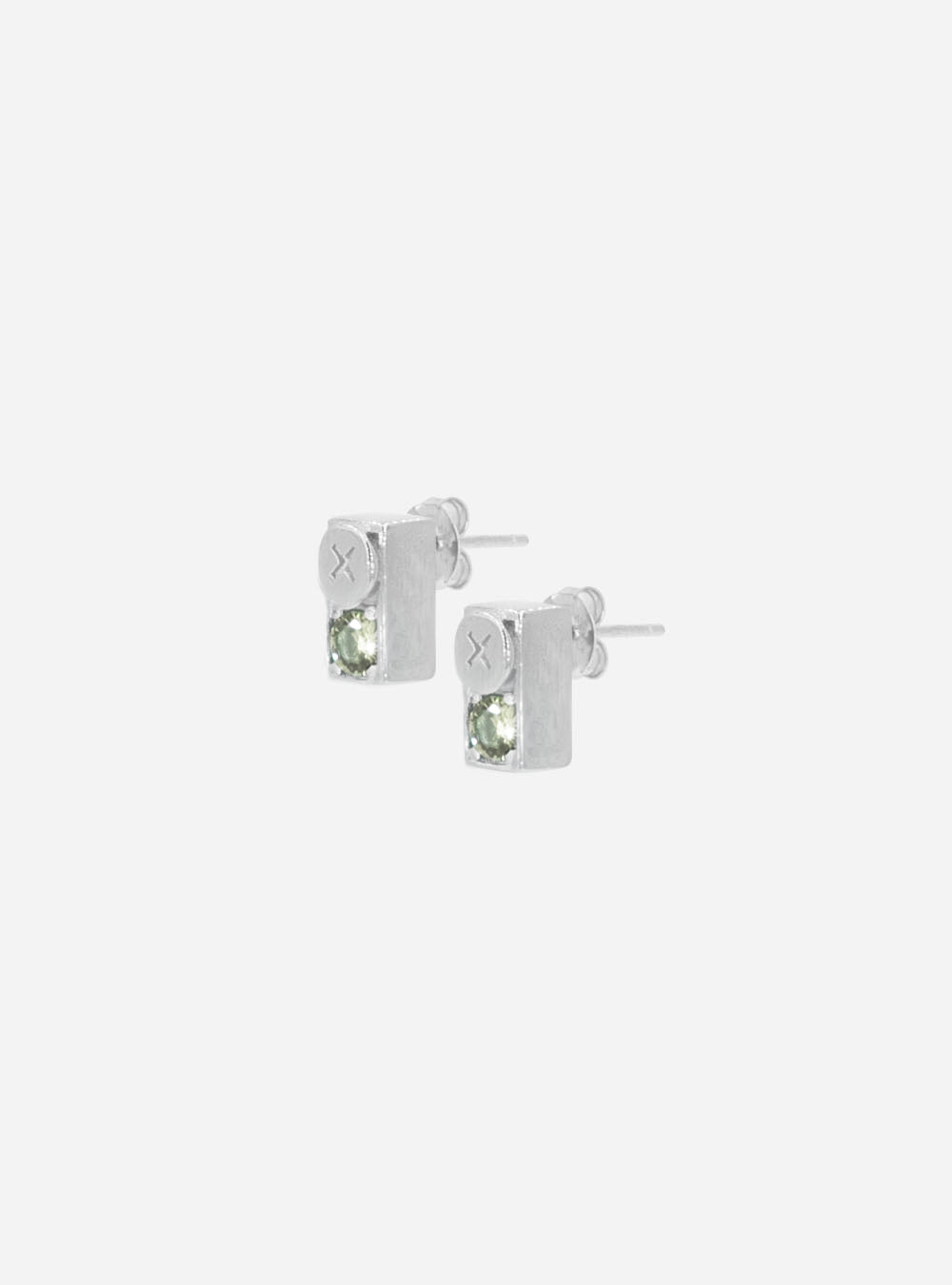a pair of MIDNIGHTFACTORY Screwbox colour-changing earrings with green stones.